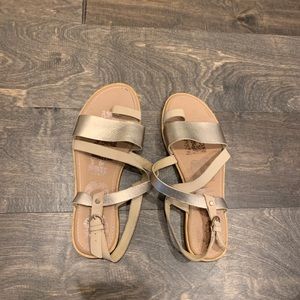 Gold and tan Sorel sandals